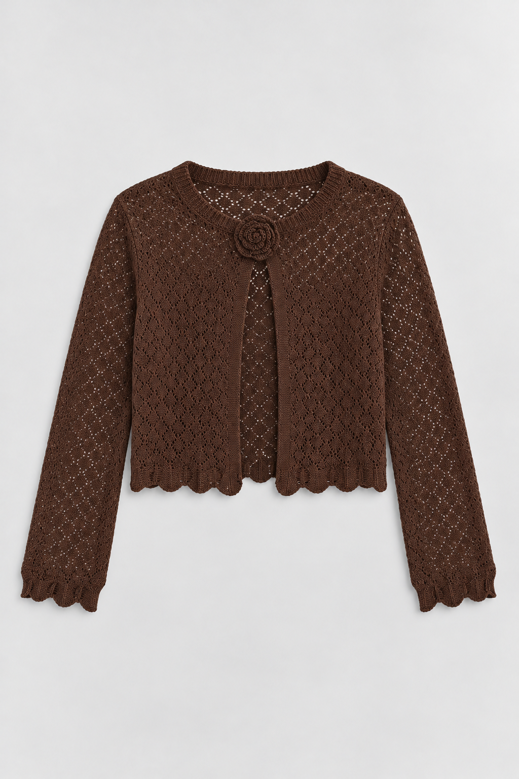 Carolina brown knit cardigan with a flower detail at the neckline and scalloped hem and cuffs.