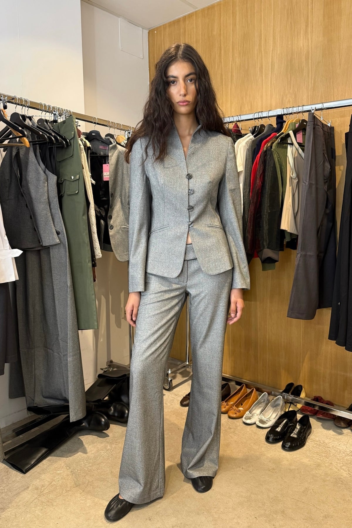Andrea grey wide-leg trousers with contrast black piping, front view