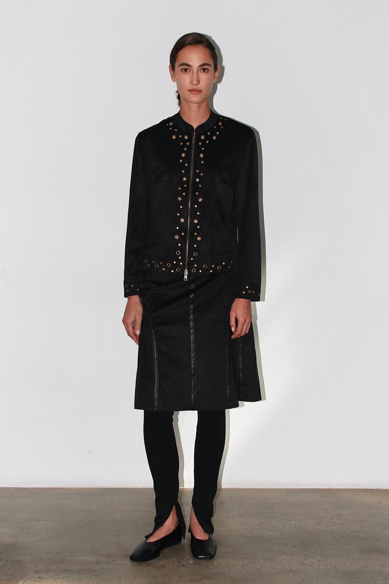 Front view of the Bella Black Jacket – tailored black jacket with gold buttons and structured fit.