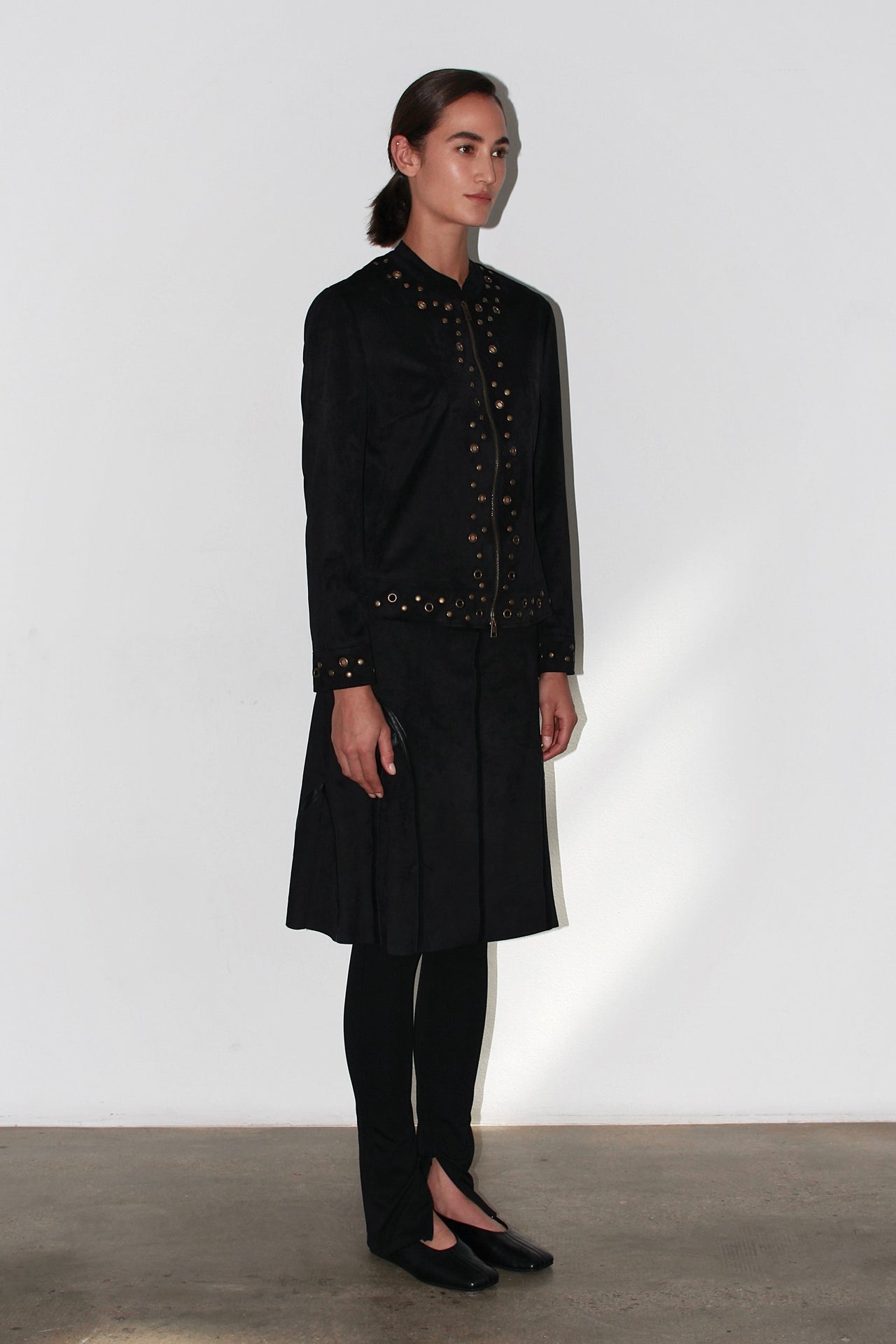 Front view of the Bella Black Jacket – tailored black jacket with gold buttons and structured fit.