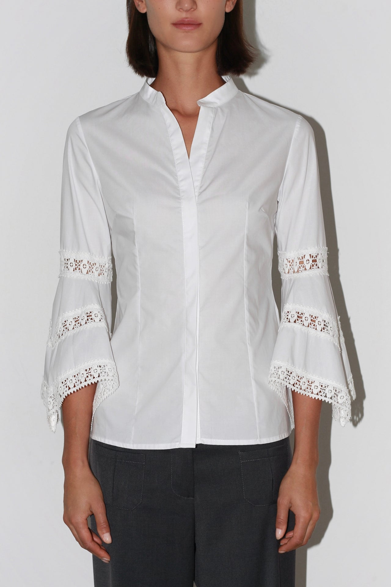 Front view of the Isabelilla Shirt – classic white button-up shirt with a tailored fit and pointed collar.