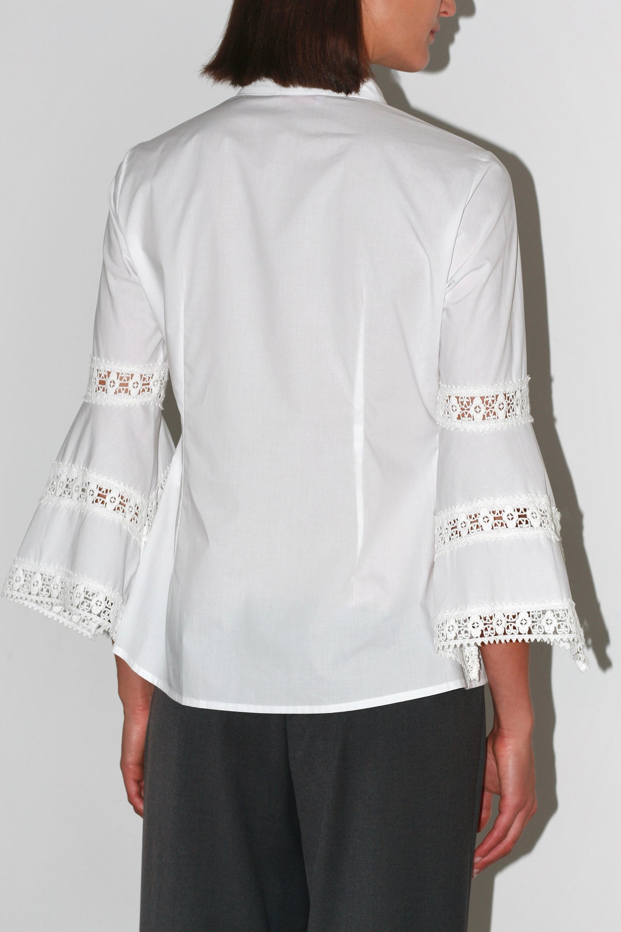 Front view of the Isabelilla Shirt – classic white button-up shirt with a tailored fit and pointed collar.