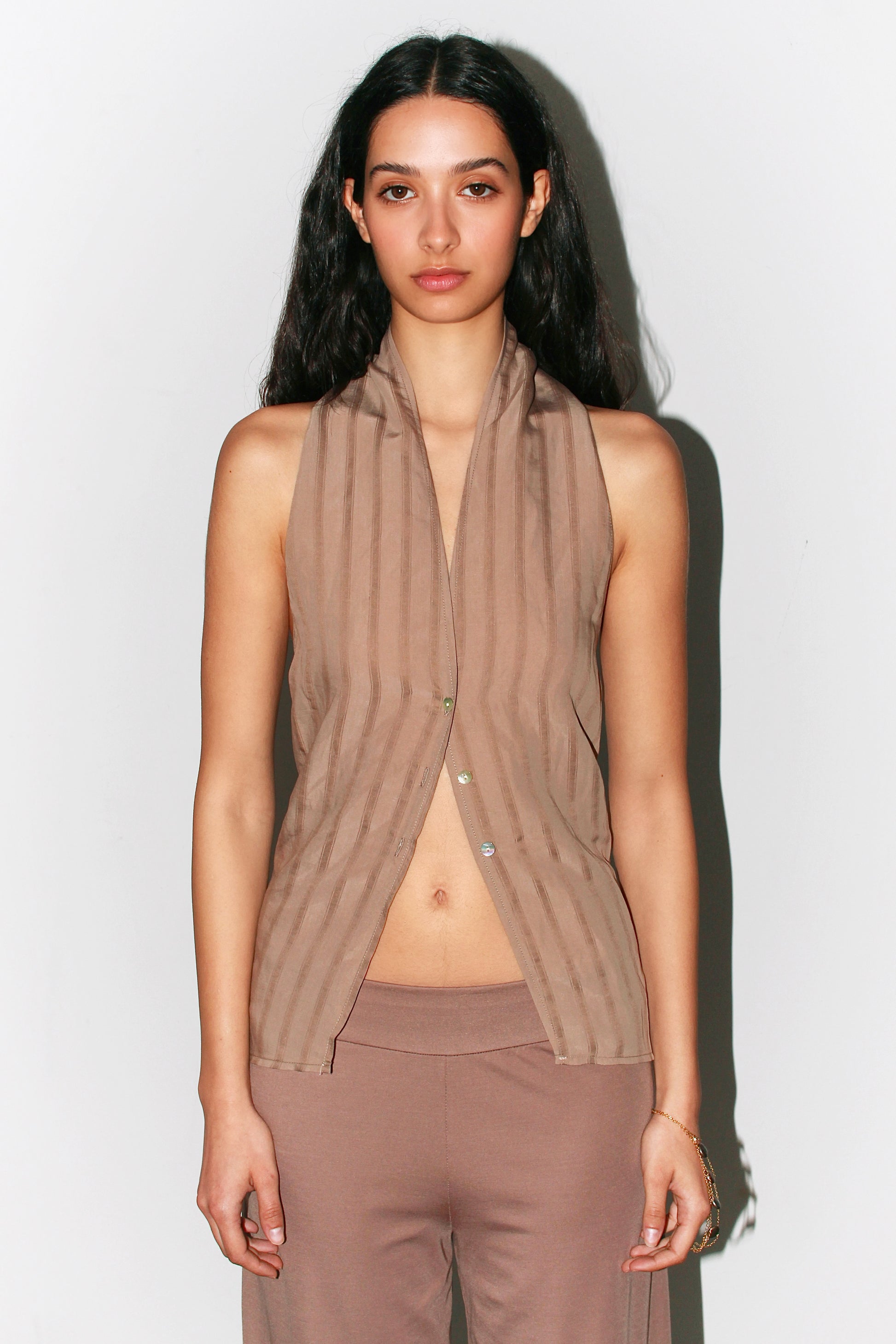 Front view of the taupe striped Belen Top, featuring contrast buttons and a convertible neckline.