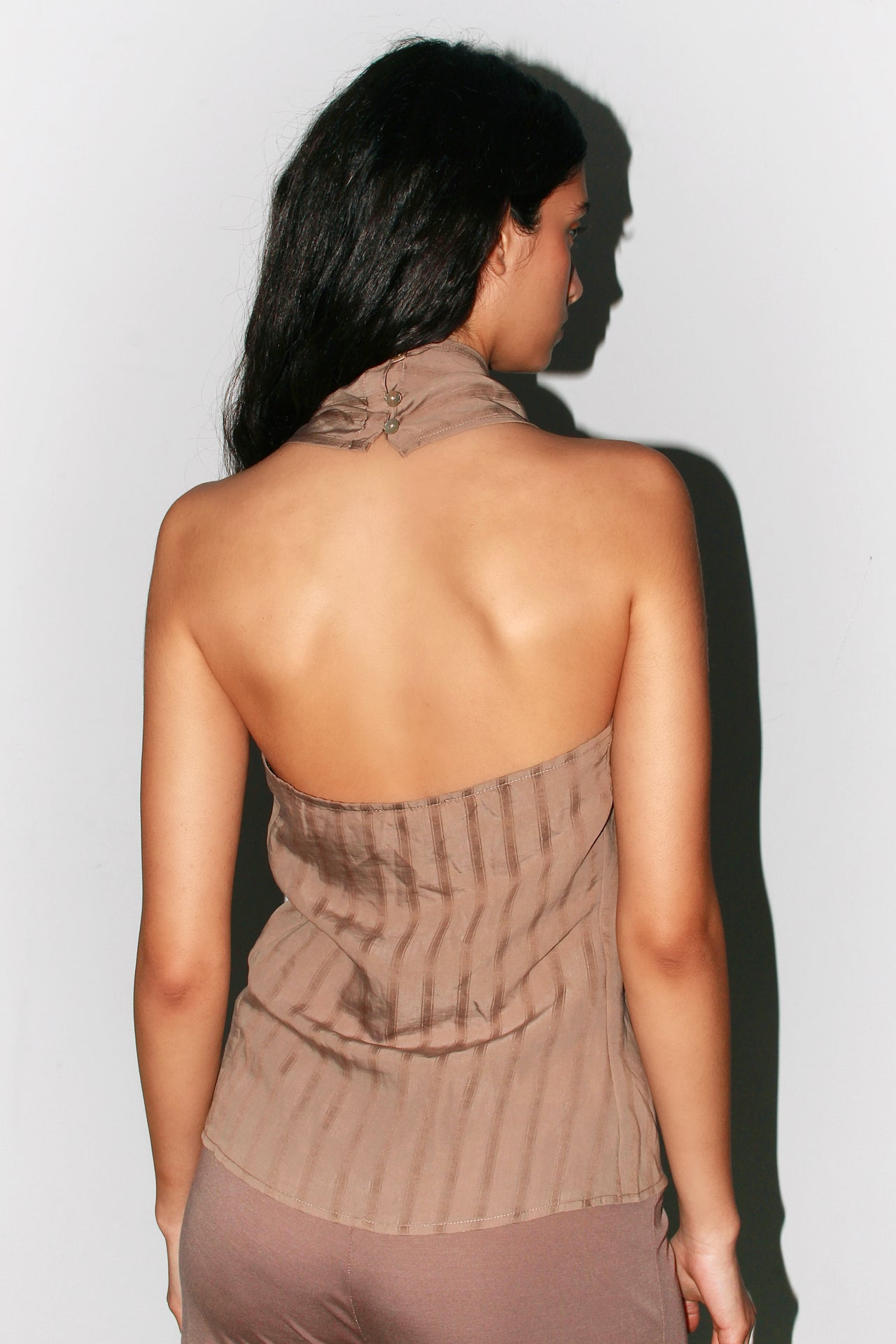 Front view of the taupe striped Belen Top, featuring contrast buttons and a convertible neckline.