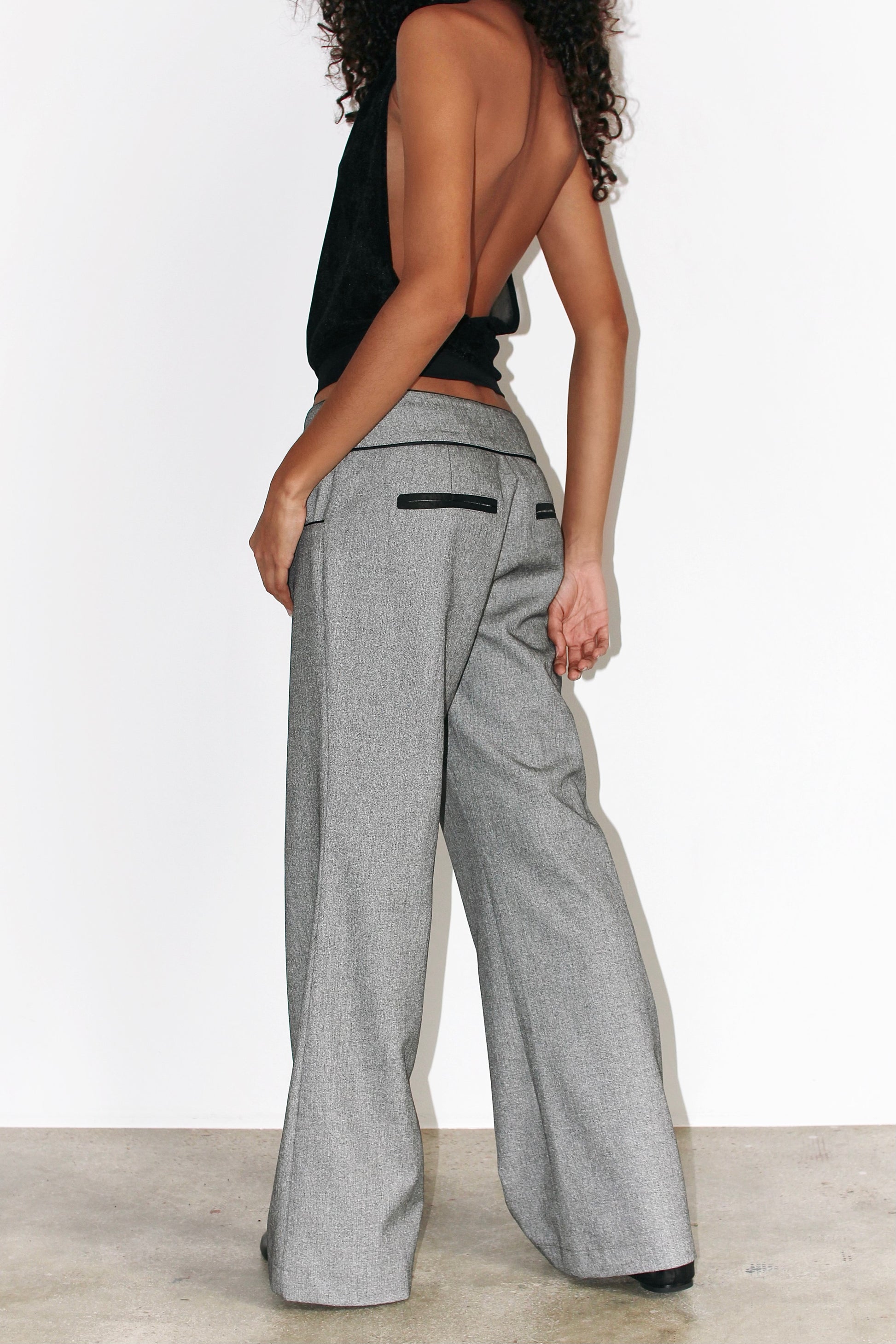 Back view of the Andrea Pants highlighting the tailored wide-leg silhouette and back seam detailing.