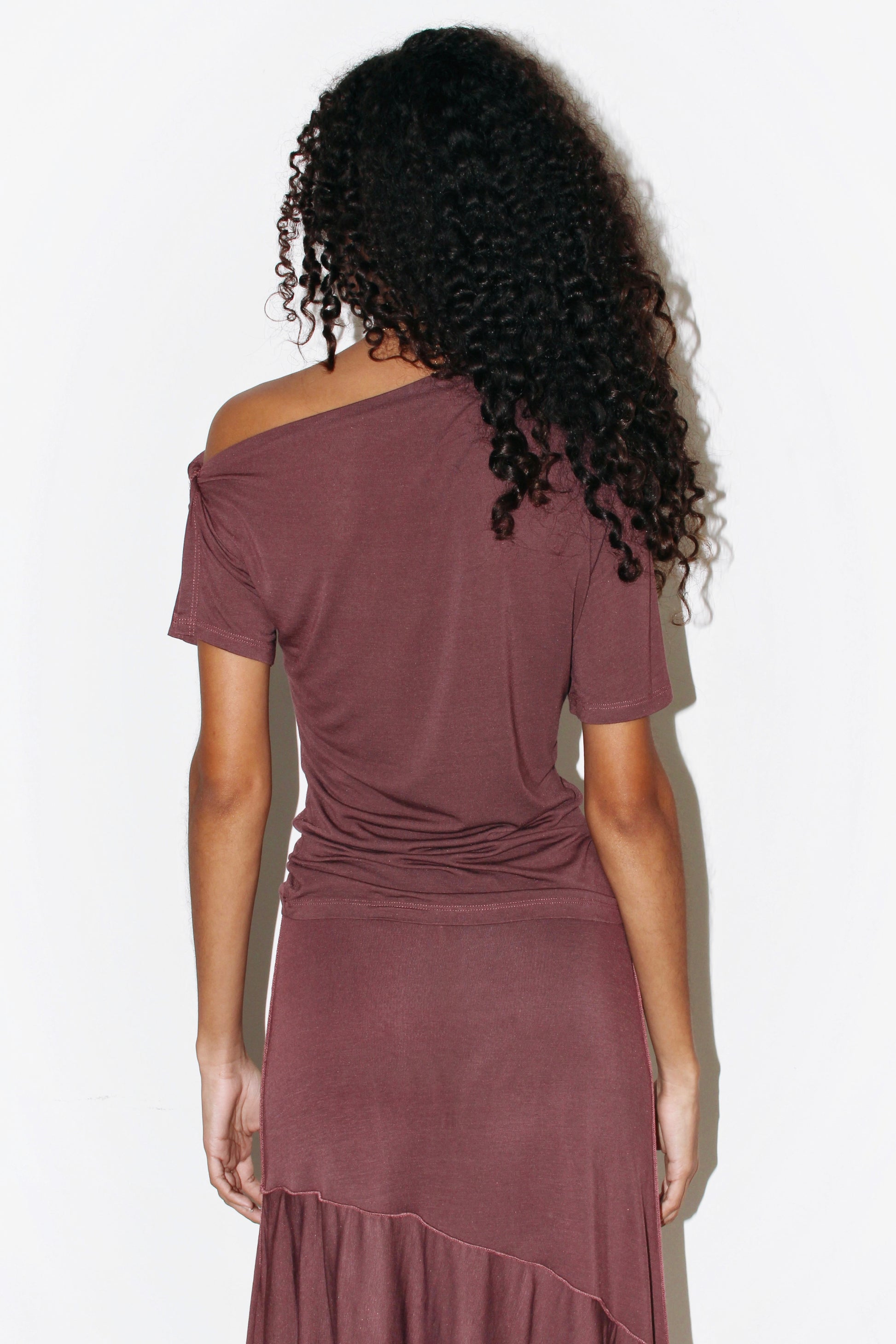 Close-up detail of the Alina Top's modal and cashmere fabric, highlighting its fine knit and subtle sheen.