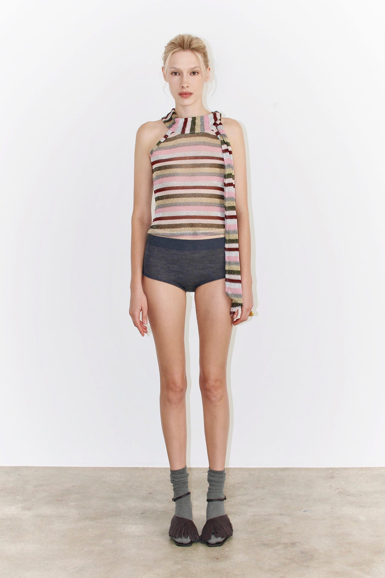 Front view of the Lora Top – sleeveless striped knit top in shades of brown, pink, and beige, straight fit and round neckline.