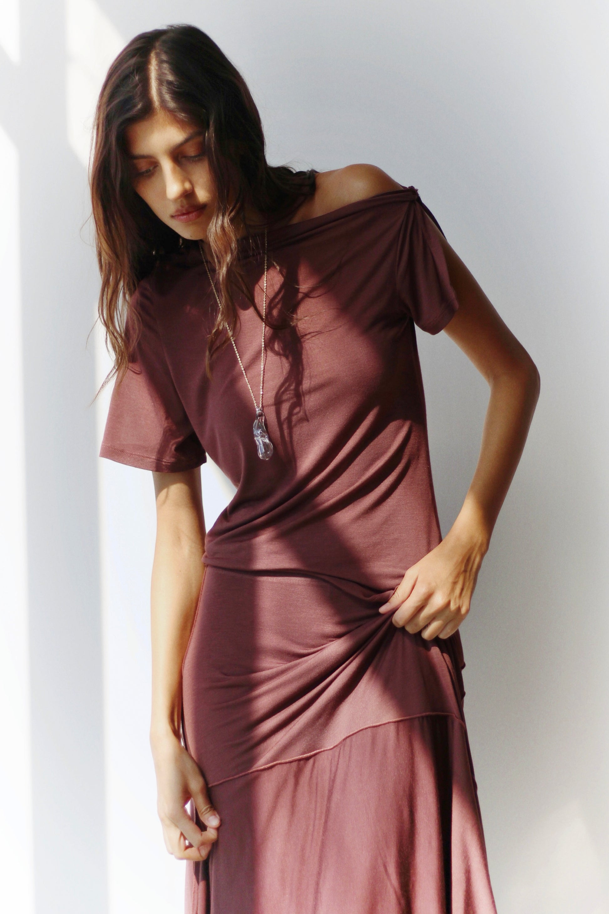 Model wearing the Alina Top paired with matching trousers, demonstrating a complete and stylish ensemble.