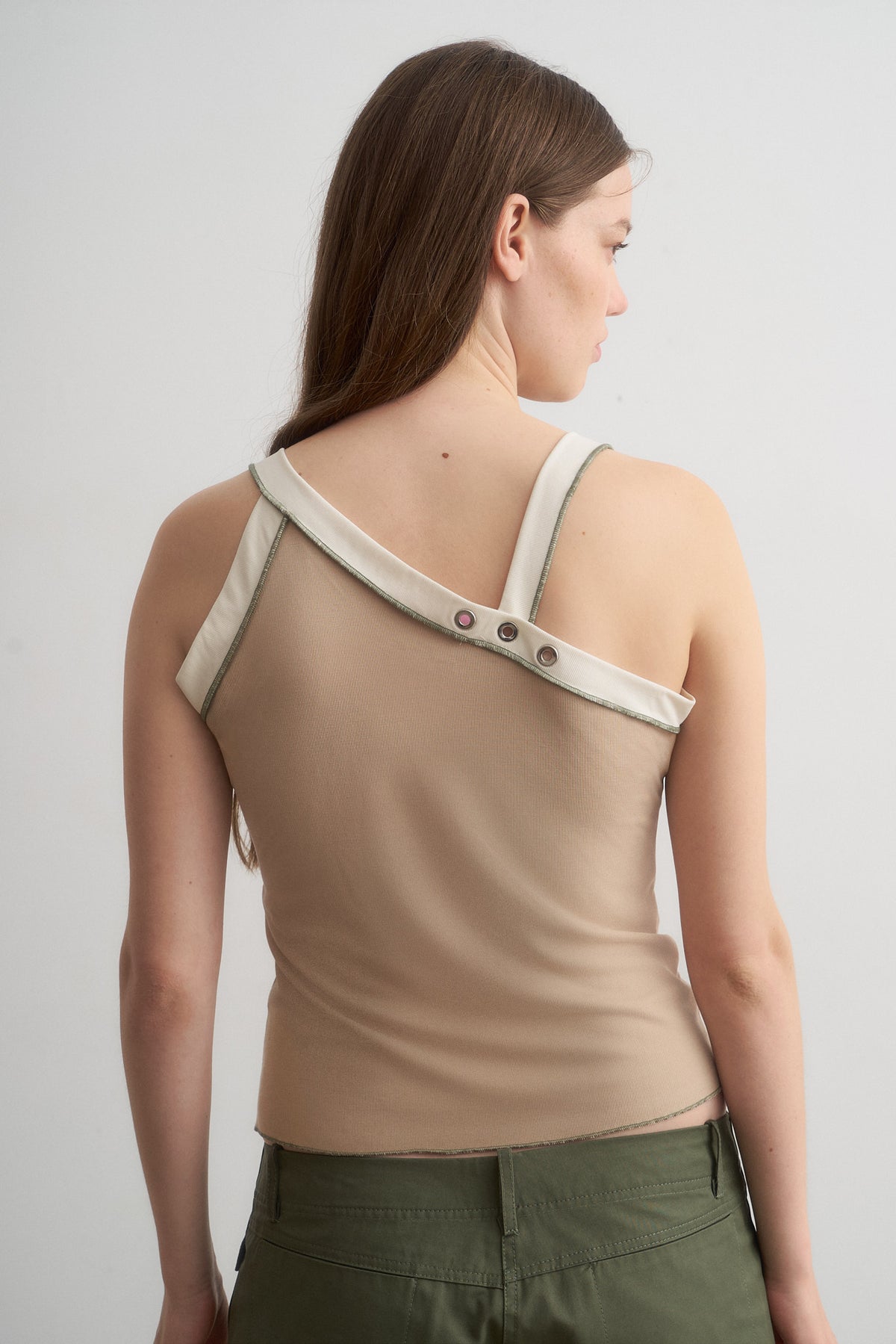 Nat beige top, rear detail showing the crossed ivory-trimmed neckline