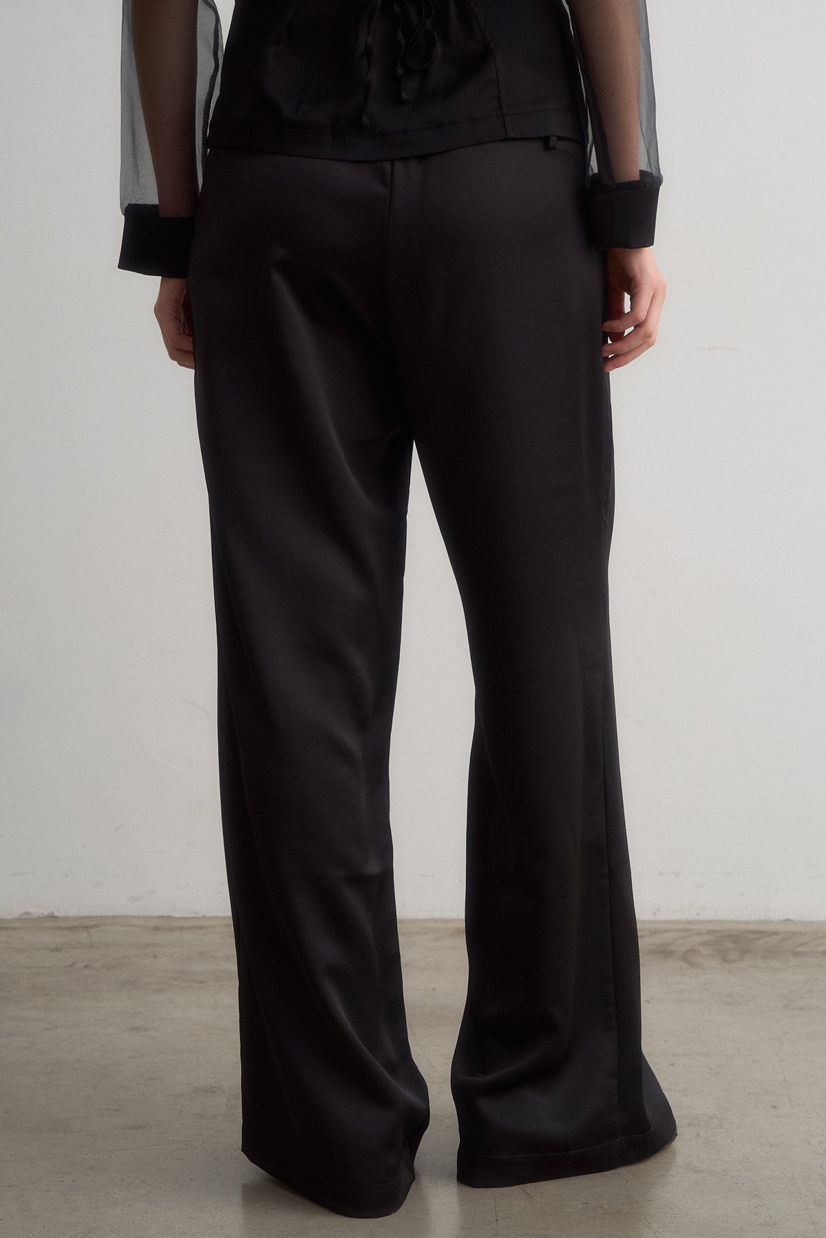 Lavi black wide-leg trousers, rear detail