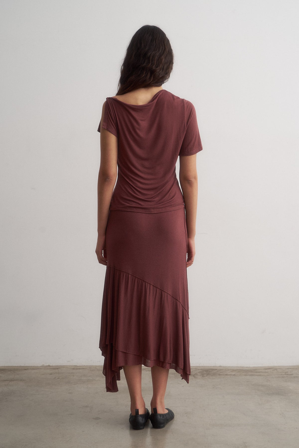 Alina burgundy top worn with Lou midi skirt, full-length rear view